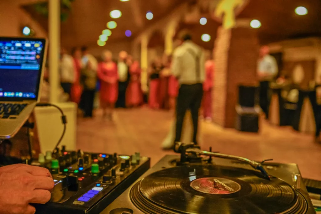 DJ turntable and mixer at indoor party