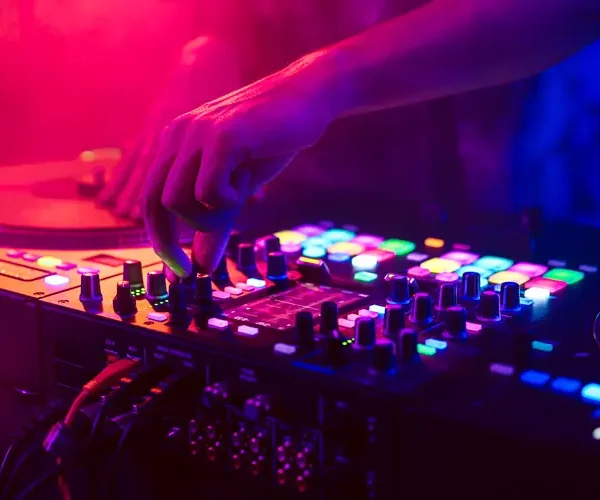close-up-dj-hands-dj-console-mixer-concert-club close-up-dj-hands-dj-console-mixer-concert-club
