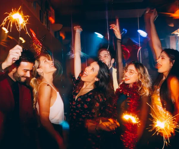 group-friends-having-fun-holding-sparklers-new-years-party group-friends-having-fun-holding-sparklers-new-years-party