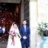 javier resenas whitelion Bride and groom exiting church with confetti.