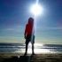 pedro resenas whitelion Person standing on beach with sun overhead